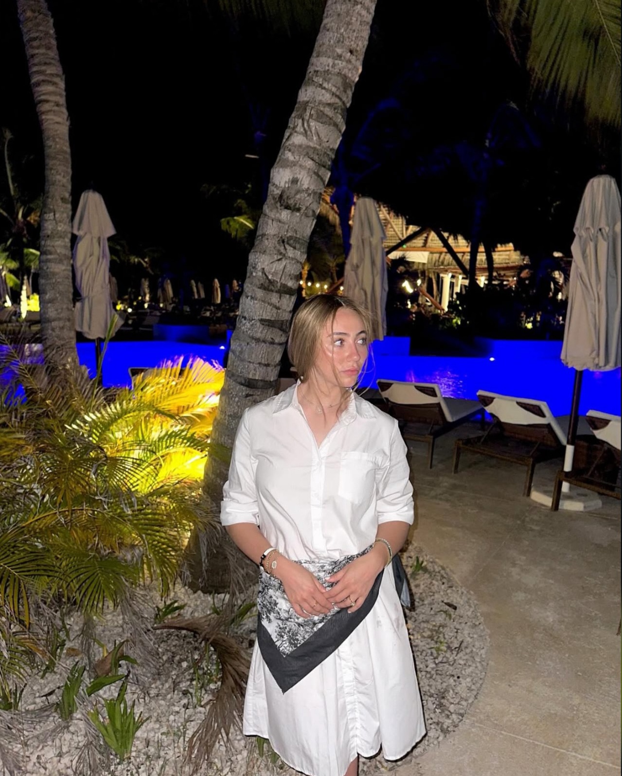 Instagram post with the caption: We’ve been loving the scarf-on-dress trend — and @gaylie_duitz j...